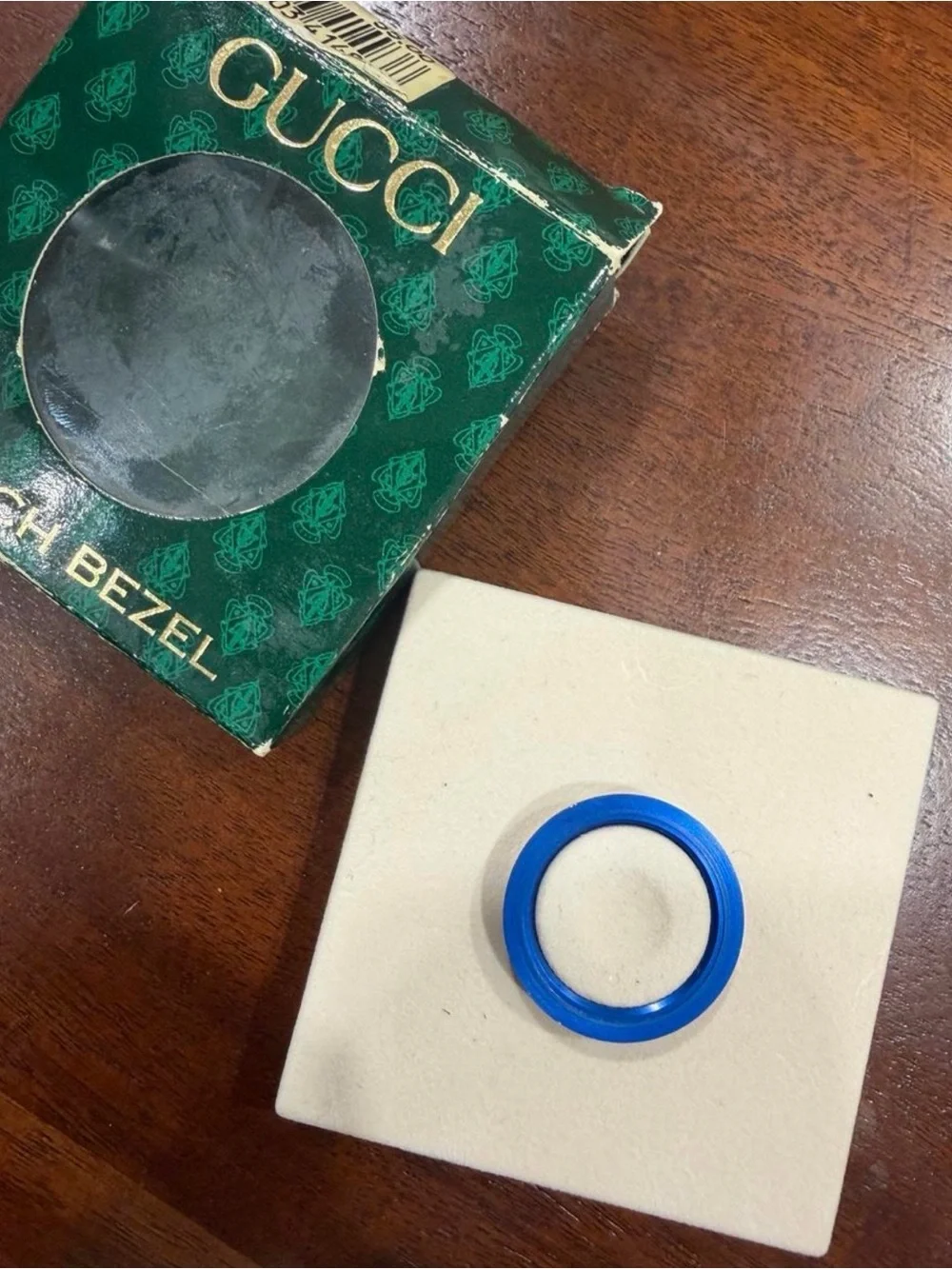 Gucci metal bezel blue